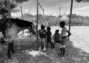 Laura Mommicchi in Africa with horses and kids