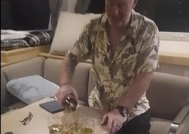 The crew toast Neptune as they cross the equator