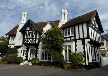 Large church property exterior painting in Worthing Sussex, traditional black and white
