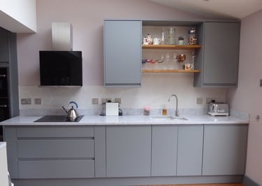 a kitchen with a sink and a counter top