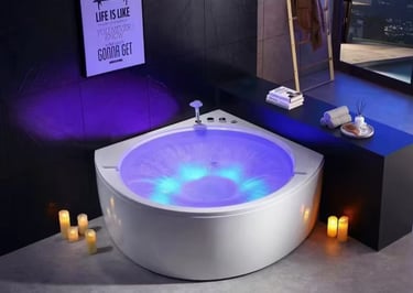 a bathtub with candles and candles on a table