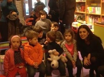enfants participant à la lecture en musique de Eva Marchal