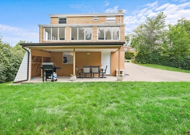 Relax in style at this contemporary vacation rental offering a game room for all ages, fire pit even
