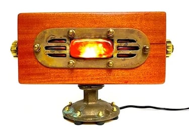 Custom light made from wood and brass objects.