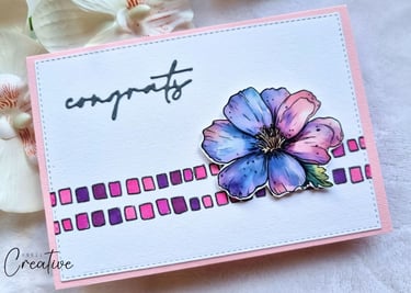 handmade card with "Congrats" sentiment, purple flower and colorful squares