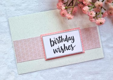 handmade greeting card in cream and pink colors, with "Birthday Wishes" sentiments on it