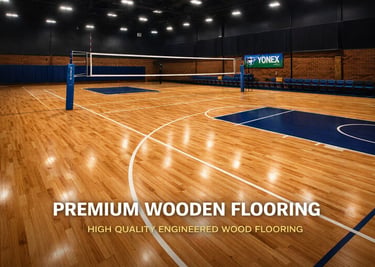 Polished premium wooden flooring in a professional indoor volleyball court and sports arena.
