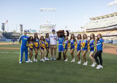 a group of cheerleaders posing for a photo