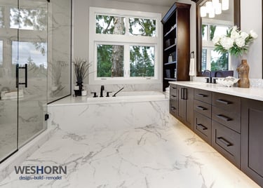 Luxury bathroom renovation with frameless glass shower and heated tile floors in Lake Forest IL.