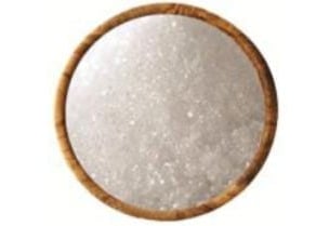 Decorative pink salt block on wrought iron stand for kitchen or wellness room display