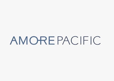 Logo of AMOREPACIFIC, a global beauty brand whose standards are met by King Fly.