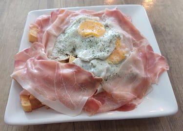 huevos rotos con jamón