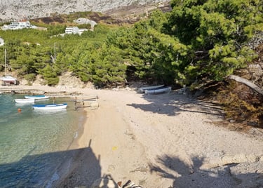 The photo shows Rape's western end, the best beach for families with children.