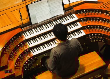 at the console of the Esplanade Klais organ (SG)