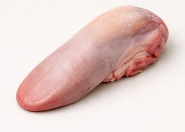 Lamb tongue, tender organ meat for slow-cooked dishes.