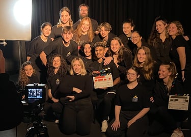 a group of people posing for a photo