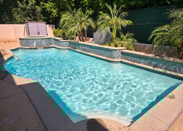 Modern pool with crystal-clear water and sleek tile design, ideal for showcasing luxury pool maintenance by Piscus Pools.