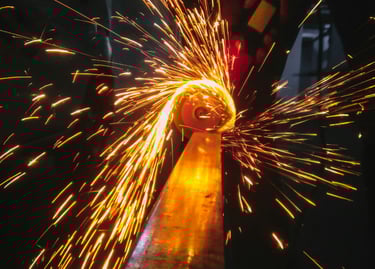 grinding and deburring a metal part