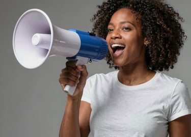 Man with megaphone speaking to a crowd
