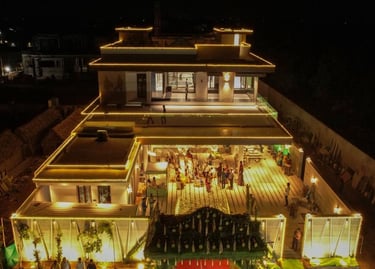 a large house with a red carpet and a red carpet