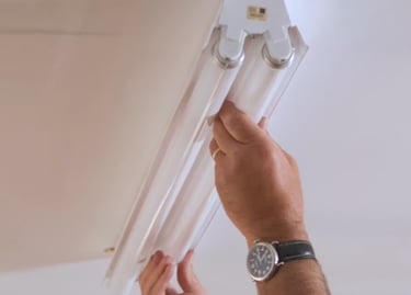 putting a fluorescent lamp in its proper position