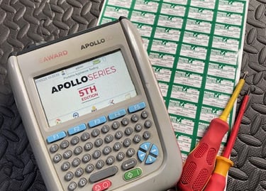 a multi-tester with labels and screwdrivers