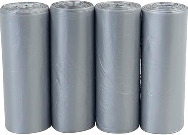a group of four rolls of grey tissue paper rolls