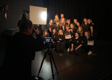 a group of people posing for a photo
