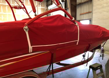 Sunbrella boat cover with zippers.