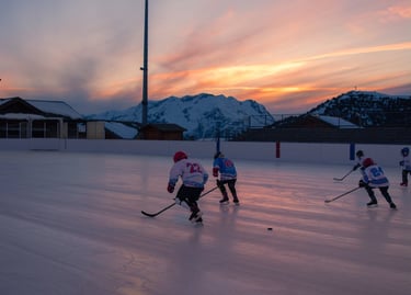 a group of people playing hockey on a field