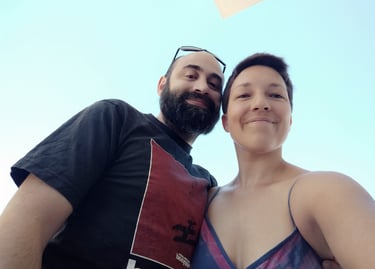 A couple standing next to each other