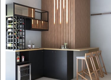 a kitchen with a bar stool and a bar stool