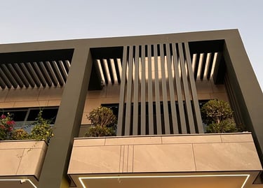 Vertical aluminum louver screen for villa window privacy and modern facade design.
