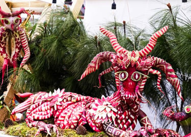 Intricately carved radish sculptures of mythical creatures at the Noche de Rábanos festival in Oaxaca.