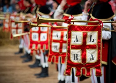 Medieval trumpet players in traditional costumes holding brass instruments with red and white heraldic banners.