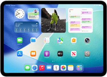 a tablet with a picture of a woman in a green dress