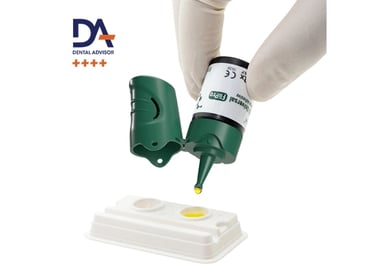 a person in gloves and gloves is holding a bottle of liquid