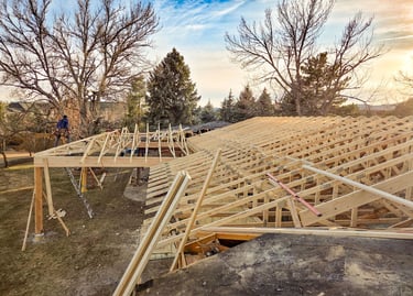 Structural roof truss system installation for a residential construction project in Lakewood, Colorado.