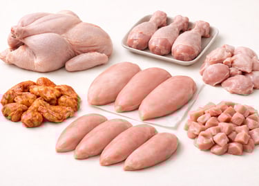 Processed halal chicken cuts including breast fillets, wings, drumsticks, and diced poultry