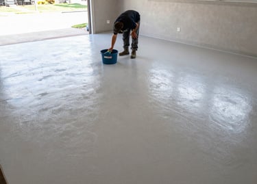Decorative flake epoxy garage floor coating installation in residential garage