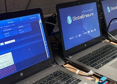 Laptops being data erased using Global Erasure's specialist overwriting sfotware