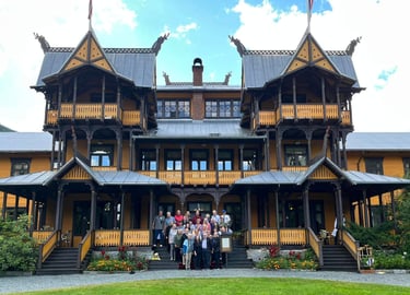 telelaget tour group in front of a  building with midieval  architechture