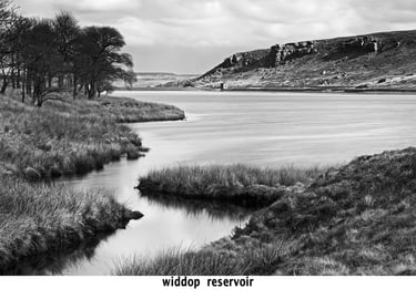 a black and white photo of widdop reservoir fine art water