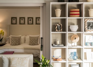 Cozy bedroom with built in shelving