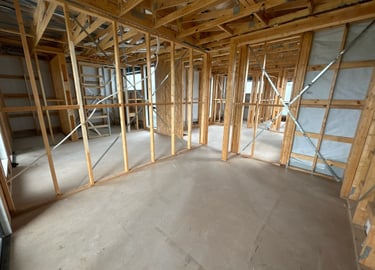 inside timber framed house at lockup stage