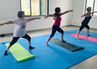 a woman is doing yoga exercises on a mat
