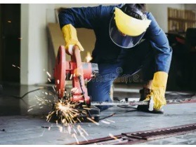 Sparks flying from a metal cutoff saw