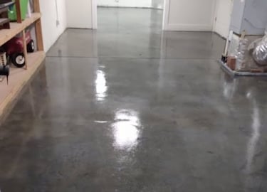 a garage floor with a garage flooring system