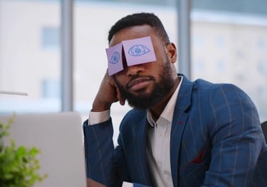 a man in a suit and tie with fake eyes