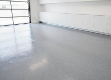 Decorative flake epoxy garage floor coating installed in a residential North Texas garage